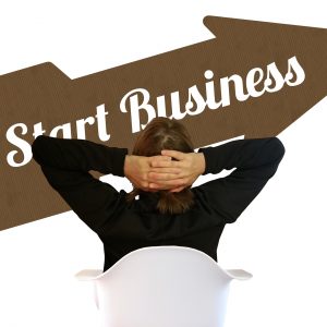 photo-of-man-and-start-business-sign